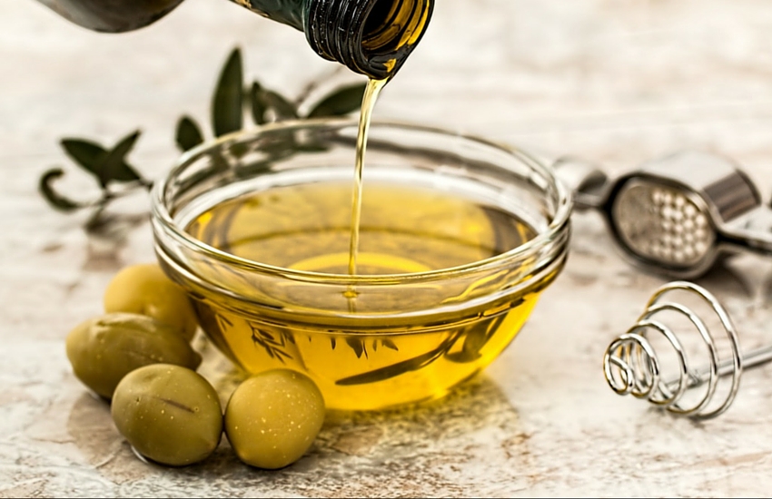 olive oil for hair in a bowl